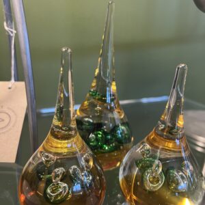 A beautiful set of 3 Murano style teardrop paperweights.